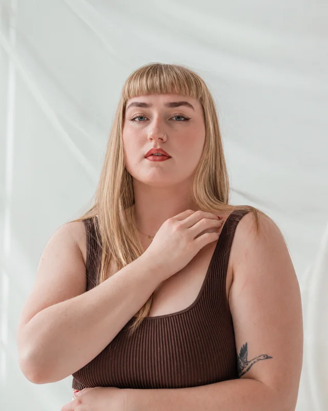 Brown hair changed to honey blonde on the same stock portrait